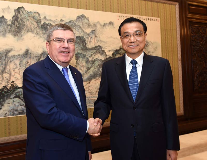 习近平会见国际奥委会主席考文垂和终身名誉主席巴赫